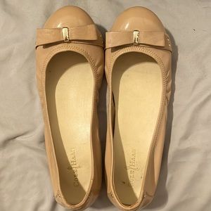 Cole Haan tan perforated flats